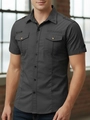 Detail of dark charcoal cotton work shirt featuring shoulder epaulettes and flap pockets - Dark Gray