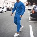 Detail of Klein blue men's casual two-piece tracksuit featuring long sleeve sweatshirt and joggers - S / Top And Bottom / Blue