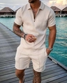 Detail of men's cream leisure polo set with geometric jacquard texture on sea resort boardwalk - Khaki