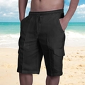 Dettaglio di pantaloncini cargo neri in lino con coulisse e ampie tasche laterali - Cappello di girasole nero