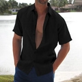 Close-up of a men's black knit short sleeve shirt with classic collar by the lakeside - Black