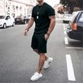 Close-up of black men's casual two-piece tracksuit with t-shirt and drawstring shorts - M / Black