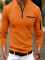 Dettaglio della polo arancione a maniche lunghe con zip sul braccio e bordo nero - Taglia S / Top / Arancione