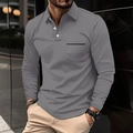 Detailed view of gray long-sleeve polo shirt featuring a buttoned collar and chest pocket - Gray
