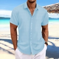Detail of light blue men's cotton linen shirt with vertical stripes in a beach setting - S / Light Blue