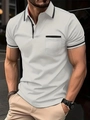 Close-up of men's white polo shirt featuring black contrast trim and chest pocket detail - S / Light Gray