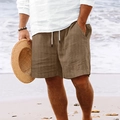 Primer plano detallado de pantalones cortos de playa marrones con cordón y bolsillos - S / Bottoms / Café