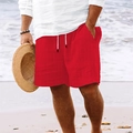 Detail of red linen beach shorts for men with textured fabric and drawstring waist - S / Bottoms / Red