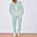 Detail of light mint green linen shirt with stand collar and textured fabric weave - S / Top And Bottom / Light Green