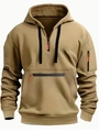 Details des khakifarbenen Hoodies mit Ärmeltasche und orangen Zippern an der Kängurutasche - S / Camel