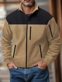 Detalle de chaqueta de forro polar camel y negro con bolsillos con cremallera y textura - Caqui