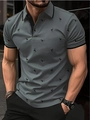 Detailed view of grey men's Polo shirt with black flamingo print and contrasting collar trim - S / Dark Gray