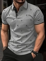 Detail of grey men's slim fit Polo shirt featuring all-over black flamingo print - S / Gray