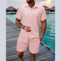 Detailed view of pink textured waffle fabric on men's summer vacation shirt and shorts set - S / Pink