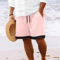 Pink men's waffle knit beach shorts with black trim and drawstring waist in beach setting - M / Pink
