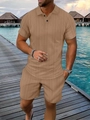 Detailed knit texture of men's summer short sleeve polo and shorts set in warm brown - S / Caramel color