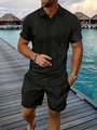 Dettaglio completo polo uomo nera in maglia con trama 3D a diamante e stile vacanza - S / Nero