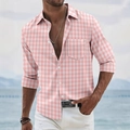 Men's pink gingham short sleeve shirt with chest pocket and white buttons outdoors - S / Pink