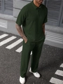 Detailed view of dark green textured knit polo shirt and trousers on male model - S / Top And Bottom / Army Green