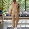 Detailed view of men's lounge set featuring textured herringbone fabric and v-neckline - S / Top And Bottom / Khaki