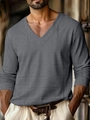 Detail of grey men's V-neck polo shirt showing textured knit fabric and premium weave - S / Grey Plaid
