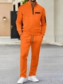 Heren trainingspak in fel oranje met wafeltextuur voorzien van polo top en sportbroek - XL / Oranje