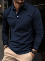 Men's navy long sleeve polo shirt featuring white buttons and a classic lapel collar - Navy Blue