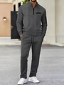 Detailed view of dark grey waffle texture polo set with arm zipper and drawstring - S / Dark Gray
