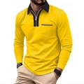 Close-up of yellow long sleeve polo shirt featuring black zip collar and chest pocket detail - S / Yellow