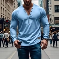 Close-up detail of light blue slim fit Henley shirt with seven-button neckline and hem tag - S / Sky Blue