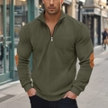 Detail von olivgrünem Cord-Sweatshirt mit Reißverschluss und orangefarbenem Ellbogen-Patch - Armeegrün