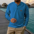 Men's blue waffle knit long sleeve Henley shirt with button neckline and chest label - S / Tops / Sapphire Blue