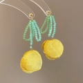 Detailed view of handmade mint green beaded earrings with yellow fabric flower petals - Light Green Faceted Bead Pleated Flower Style (28# Silver Earring Post - Green-Yellow)