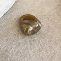 Close-up detail of a stylish brown and white marbled resin ring featuring a chunky design - 16# Marble Pattern