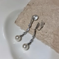 Detailed view of long zircon earrings with elegant pearls and mosquito coil clip-on backing - Mosquito Coil Ear Clip / Silver with White Pearl