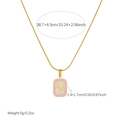 Close-up of gold-plated stainless steel necklace with palm tree pendant and size labels - Coconut Tree Style (N4219)
