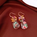 Detailed macro shot of vintage-style floral resin drop earrings with colorful beads - Flower Style (HE32042) / Pink