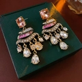 Vintage style wind chime earrings with pink and clear crystals on a dark green box - Pink Square Rhinestone Tassel Style (WE1132)