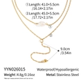 Macro detail of gold plated double-layered stainless steel necklace with pearl pendant - Double-Layered Pearl and Gold Bead Style (YYN026015)
