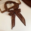 Elegant vintage brown paisley print skinny silk scarf for women tied in a chic bow - Coffee (Paisley Printed)