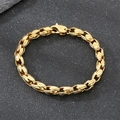 Macro view of a gold-plated stainless steel corn chain bracelet for men with lobster clasp. - Spindle Clasp Style (KB212542-KJX) / Gold