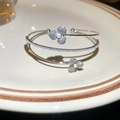 Elegant silver-toned snake cuff bracelet featuring sparkling zircon pavé and pearl clover motifs - Open Three-petal Flower Style / Silver