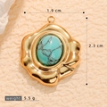 Pendente in acciaio inossidabile dorato con turchese ovale e bordo effetto lava - Pendaglio Ovale con Trama Lavica (A510085)