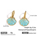 Stainless steel hoop earrings with light blue shell pendant and gold-plated finish - Light Blue Shell Hoop Earrings (DKE252095GL-TBU)