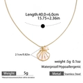 Gold stainless steel shell necklace with pearl pendant and white enamel inlay details - White Shell Necklace (DKN254095GL-W)
