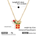 Gold stainless steel necklace featuring a festive red Christmas gift box pendant - Red Gift Box with Red Ribbon (DKN254099-9GL)