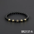 Matte black beaded crown bracelet with gold micro-pave zircon accent beads - Polished Black Beads With Gold Pave Ball Style (BR2137-A)