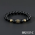 Polished black bead bracelet with a gold micro-set zircon sphere and golden metal spacers - Shiny Black Beads With Pave Zirconia Ball Style (BR2137-C)