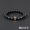 Matte black beaded bracelet with gold crown charm and blue zircon stone inlay - Matte Black Beads With Sapphire Crown Style (BR2137-E)