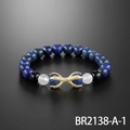 Lapis lazuli beaded bracelet with gold eagle claw charm and polished black stone accents - Lapis Lazuli Style (BR2138-A-1)